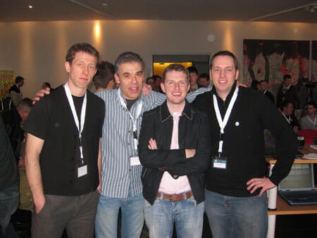 Frank Bültge, Michael Preuss, Matt Mullenweg, Alex Frison posing together at a WordPress event